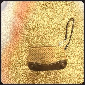 100 percent authentic coach wristlet